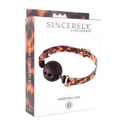 Introducing the Luxe Pleasure Amber Ball Gag - Model X1: Ultimate Control and Sensual Satisfaction for All Genders, Exquisite Tortoiseshell Strap, and Deep Plum Elegance