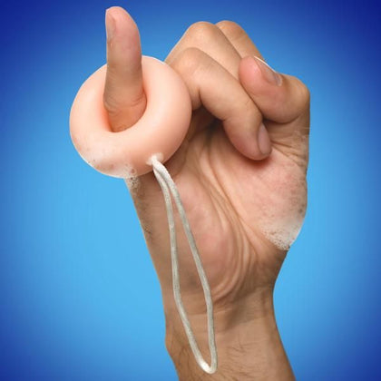 Introducing the Teeny Weeny Weiner Cleaner by PleasurePro: C-Ring Shaped Soap Model #PW01 for Men, Designed for Intimate Hygiene in a Luscious Light Peach Shade.
