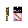 Wood Rocket Daddy Paddle Pin - Miniature Fetish BDSM Paddle Lapel Pin - Gold with Black Text - Unisex - For Hat, Clothes, Backpack, Bag, or Purse - Sharp, Please Do Not Apply to Skin - Adult Naughty Store